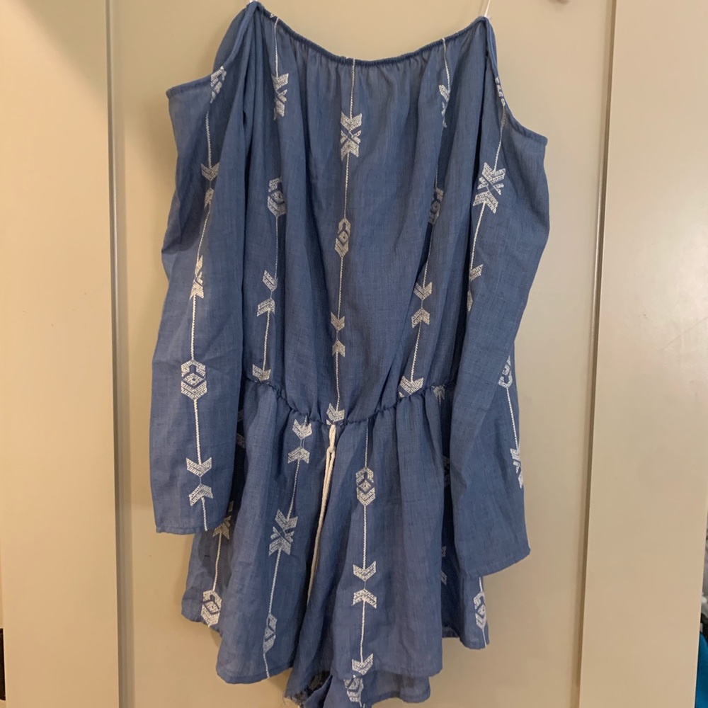 Blue romper with tassels